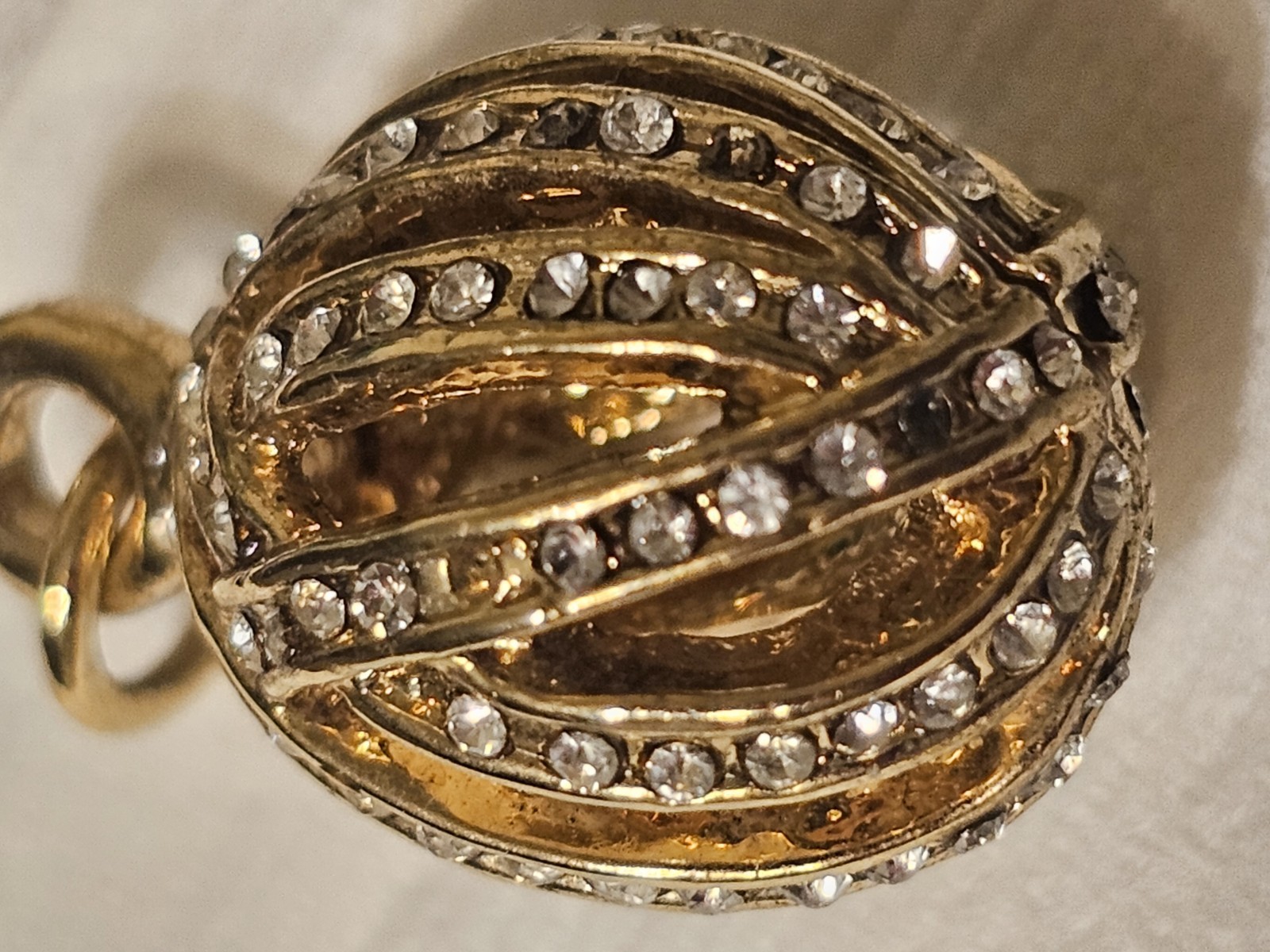 Christian Dior charm gold tone egg charm with rhinestones